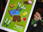 Plakat für Jubiläums-Wiesn nostalgisch mit Dirndl und Lederhose